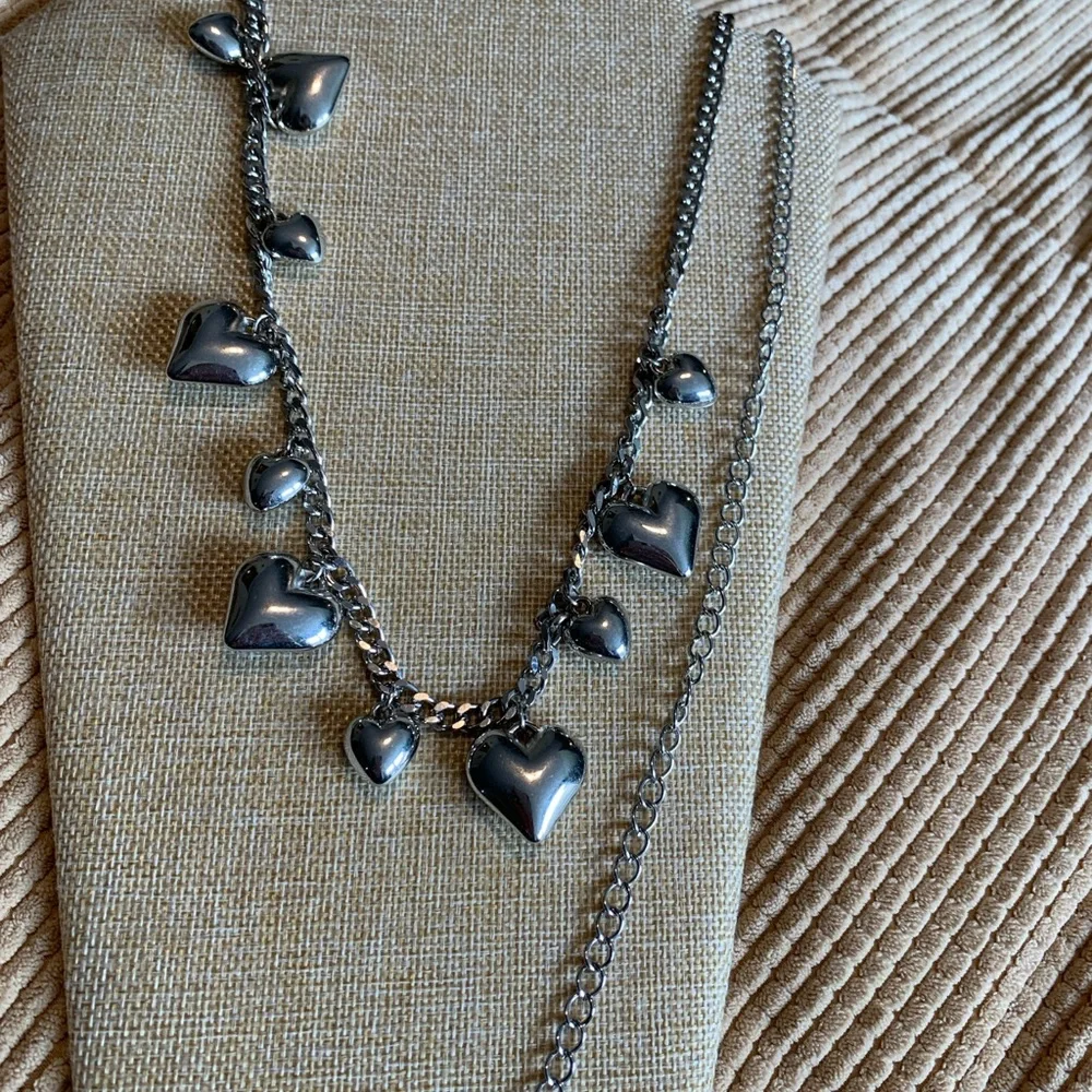 Juicy heart belly chain. Silver tone. Great condition.